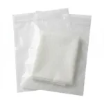 Glassine packaging bags for premium consumer goods — retro game device, smartphone, and notebook in translucent paper pouches for gift and retail use