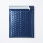 Navy blue matte pearlescent bubble mailer bag with large-dome air bubble outer surface — colored PE film, self-seal closure, custom colors available for e-commerce and retail packaging