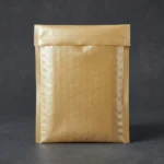 Gold pearlescent film bubble bag with iridescent shimmer outer layer and integrated air bubble cushioning — for jewelry, cosmetics, and premium e-commerce packaging