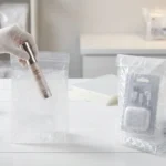 Transparent film bubble bags on e-commerce packing workbench — contents visible through clear film, self-seal closure, for consumer goods and accessories shipping