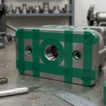 No residue green tape masking threaded holes on metal component before powder coating