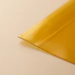 Close-up of 0.06mm amber polyimide film tape with silicone adhesive
