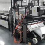 Laminated foil film feeding a bag making machine on our Suzhou foil-bag line